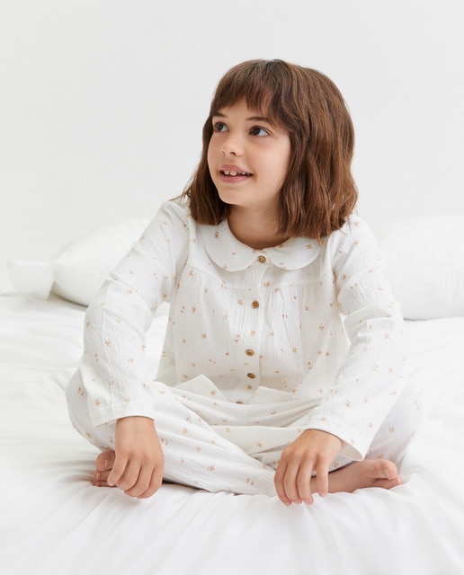 Imagem 0 de Pijama de Malha Estampado com Botões e Gola de Bebé