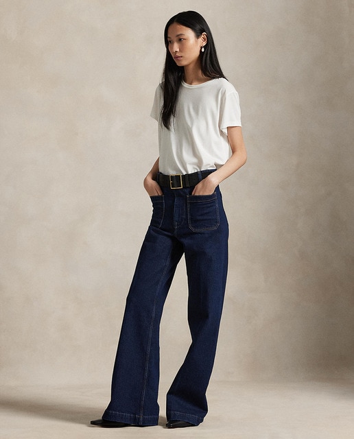 Imagem 0 de Jeans à Boca de Sino de Algodão com Bolsos de Remendo