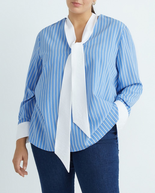 Imagen 0 de Camisa de mujer de cuello pico y manga larga.