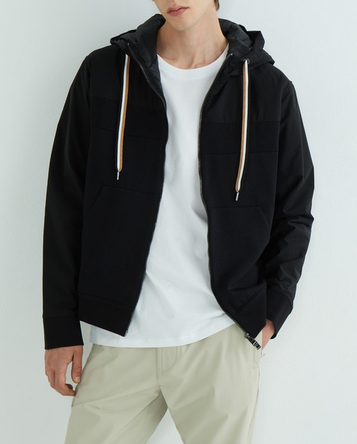 Imagen 0 de Cazadora de hombre con capucha de felpa