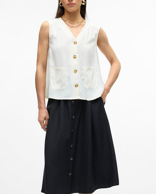 Imagen 0 de Blusa con botones de mujer con bolsillos delanteros