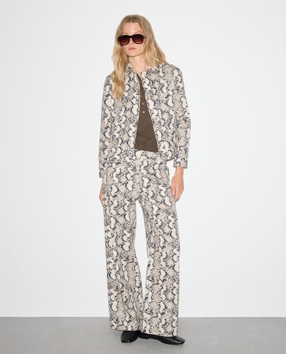 Imagen 0 de Pantalón vaquero de algodón estampado de mujer