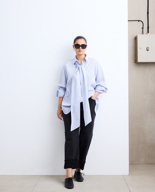 Imagem 0 de Blusa com Laço e Risca Estampada