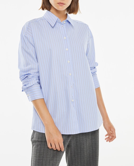 Imagen 0 de Camisa de mujer rayas azul con bolsillo frontal