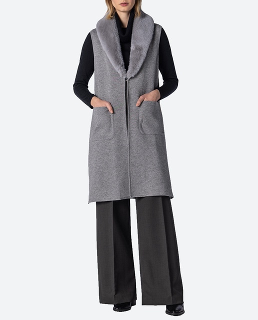 Imagen 0 de Chaleco de mujer de punto liso con bolsillos y cuello de pelo