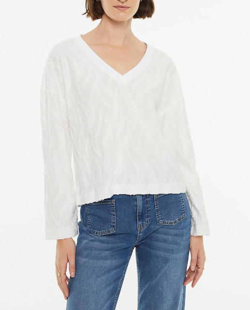 Imagen 0 de Camiseta de mujer de manga larga con cuello pico en contras