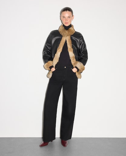 Imagen 0 de Cazadora corta lisa de mujer