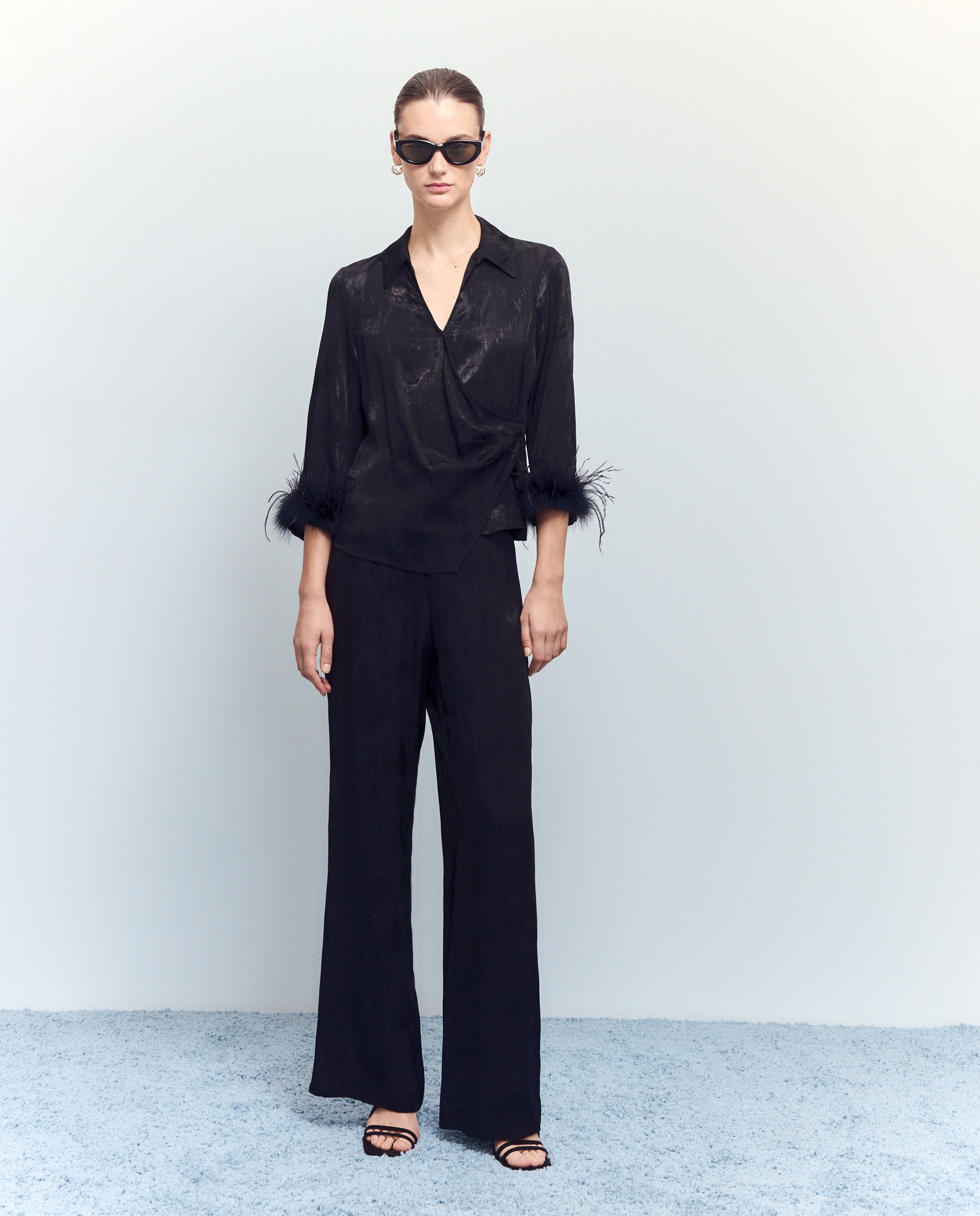 Imagem 0 de Blusa Drapeada com Pluma