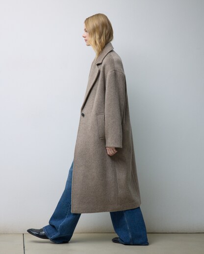 Imagen 0 de Abrigo largo liso de mujer