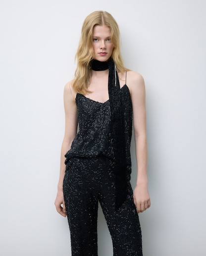 Imagen 0 de Blusa lencera de mujer con lentejuelas