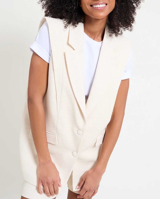 Imagen 0 de Chaleco de mujer cuello clásico y corte largo