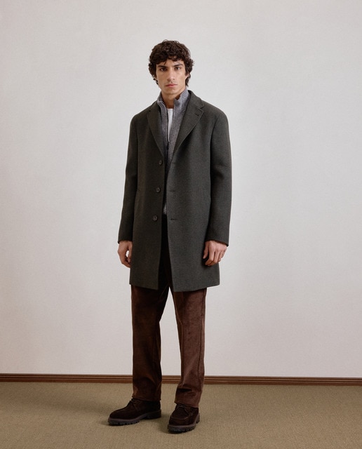 Imagen 0 de Abrigo diagonal verde modulable de hombre.