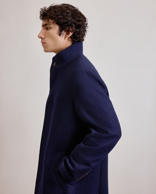 Imagen 0 de Abrigo punto con cuello chimenea de hombre