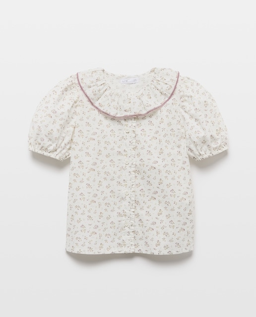 Imagen 0 de Blusa niña con volante en la tapeta