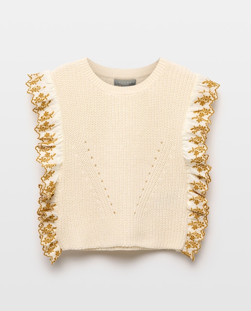 Imagen 0 de Chaleco de niña cerrado con volante bordado schiffli