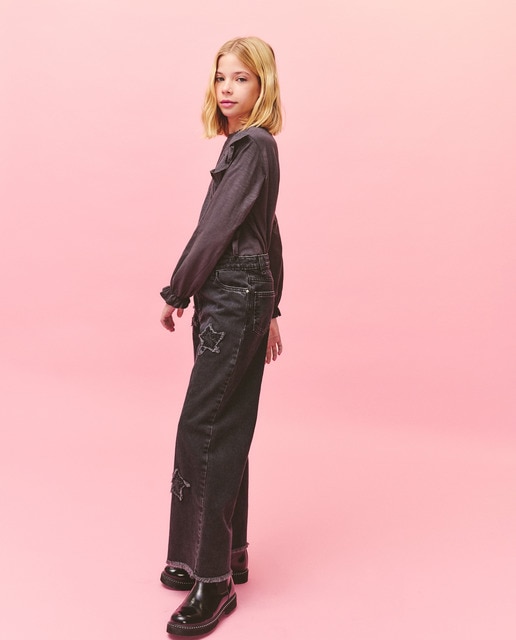 Imagem 0 de Jeans Wide Leg com Estampado e Remendos de Estrelas