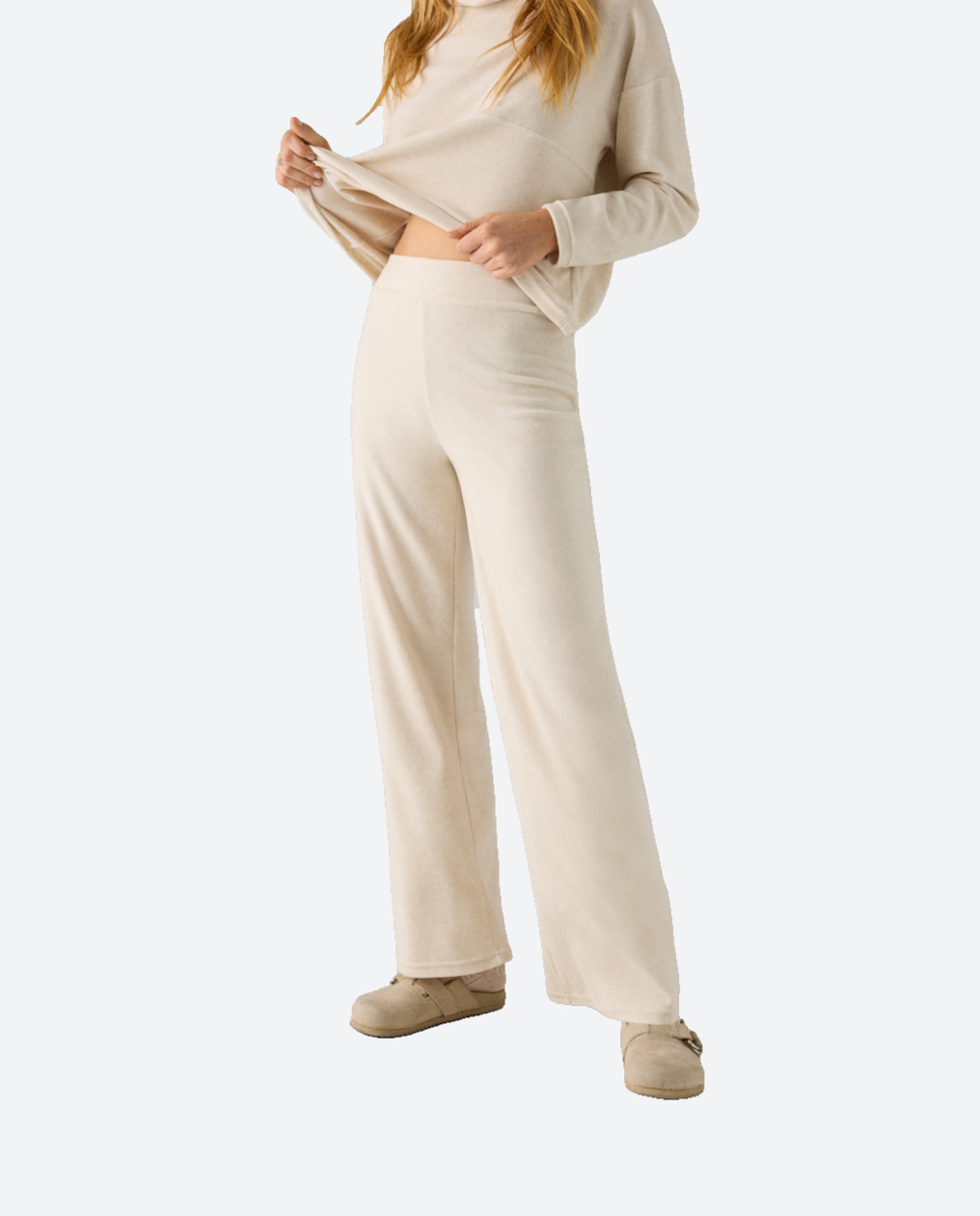 Imagen 0 de Pantalón de mujer liso con pierna ancha de tejido cálido