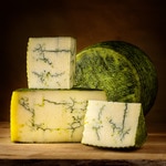 mature sheep's cheese with pesto approximate weight piece 3,5 kg