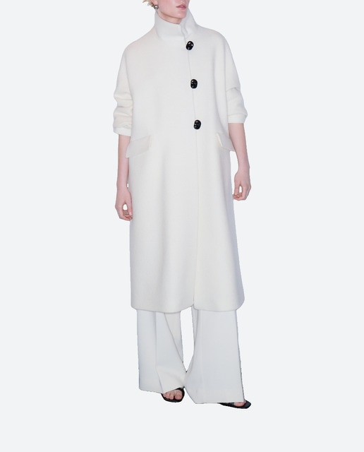 Imagen 0 de Abrigo de mujer con botones dorados