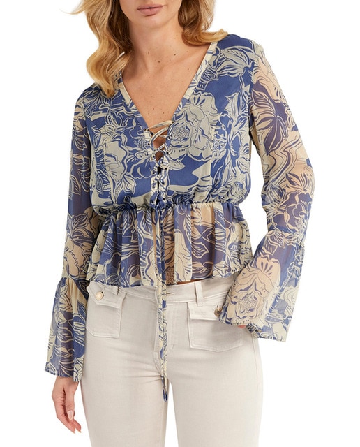 Imagen 0 de Blusa de mujer floral con lazo en escote.