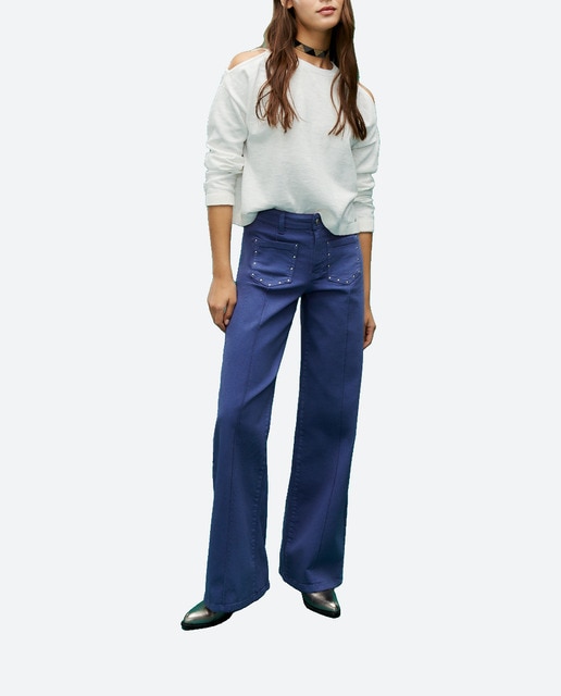 Imagen 0 de Pantalón wide leg de mujer con tachas