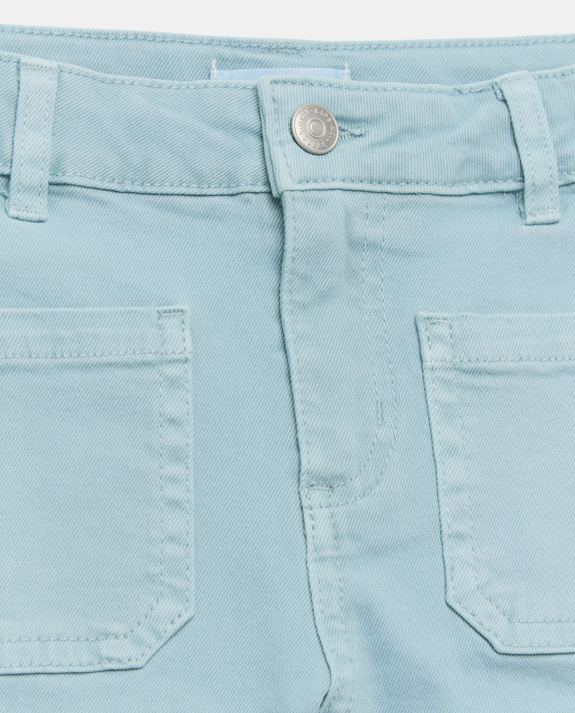 Short niña color con bolsillos de twill Jabón-3