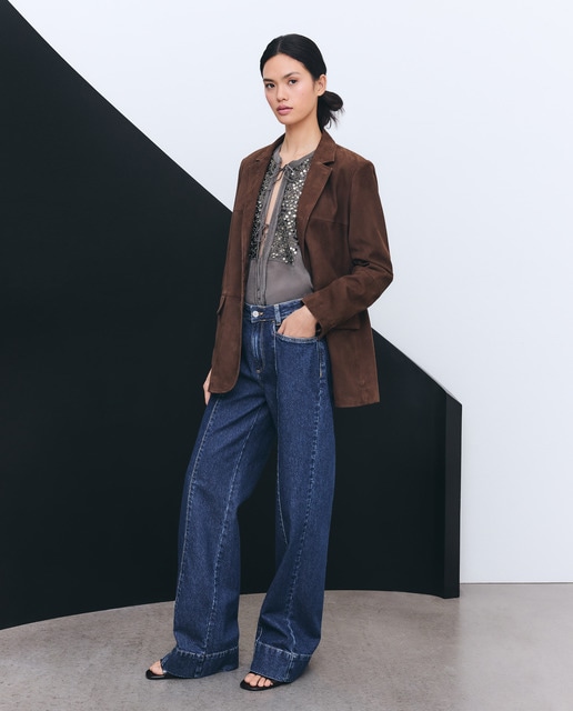 Imagem 0 de Blusa com Decote em Bico e Missangas