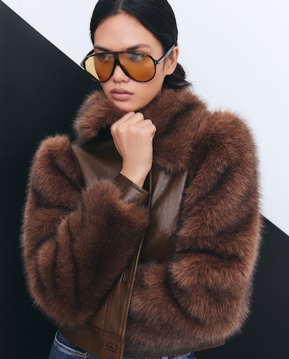 Imagen 0 de Cazadora de mujer con mangas de pelo