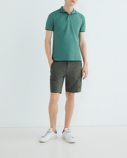 Imagen 0 de Polo liso cuello acanalado y puños de manga con rayas tricolor