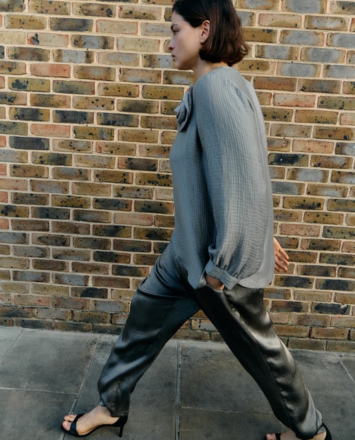 Imagem 0 de Calças Formais Metálicas