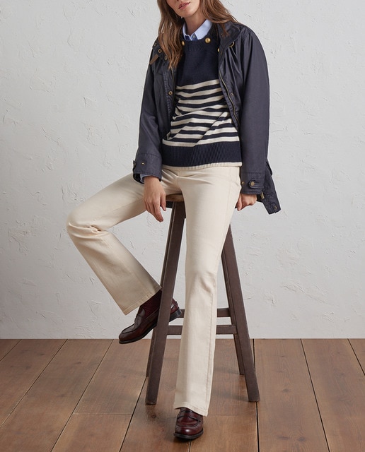 Imagen 0 de Jersey de mujer con rayas y botón dorado