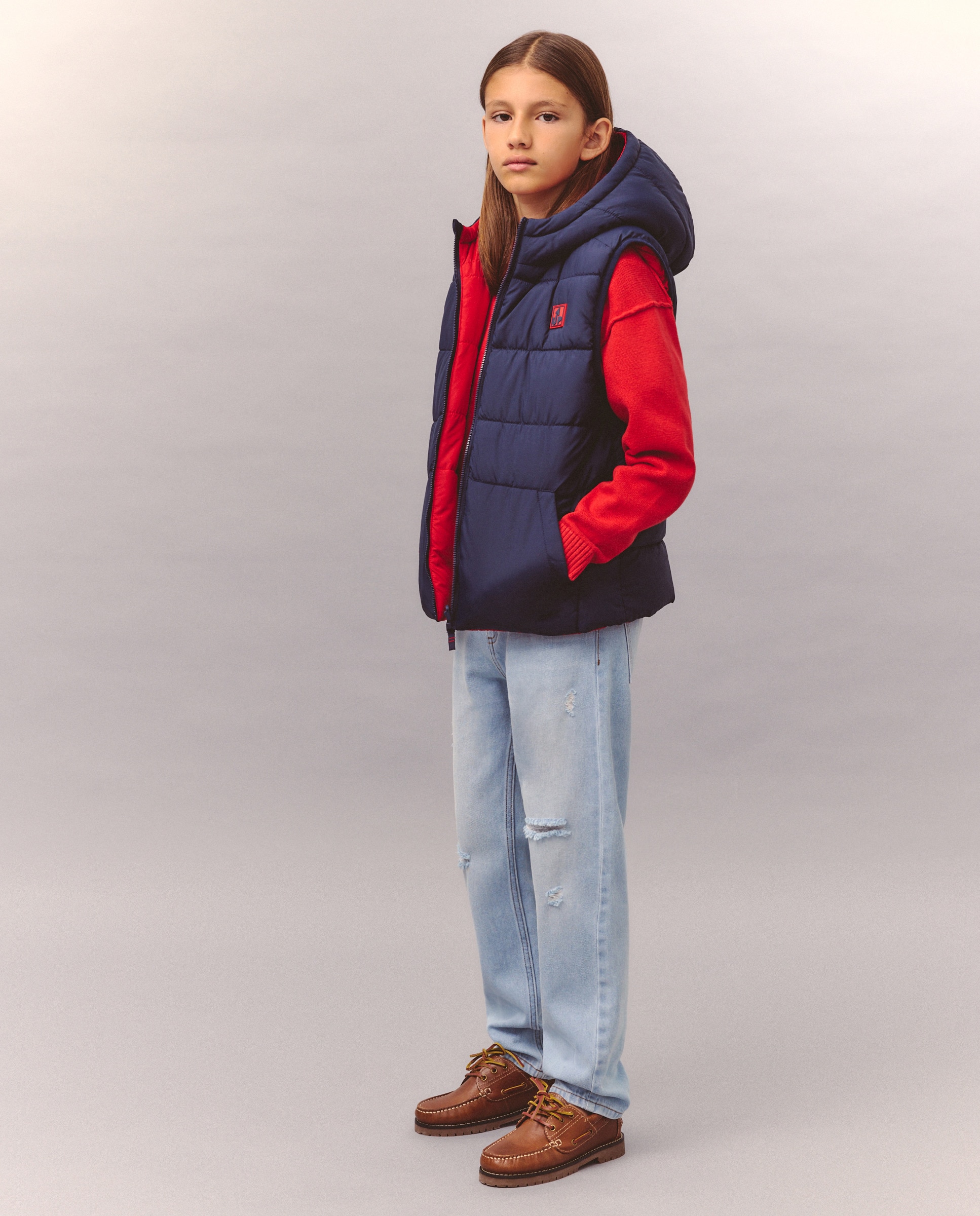 Imagem 0 de Colete Reversível com Capuz