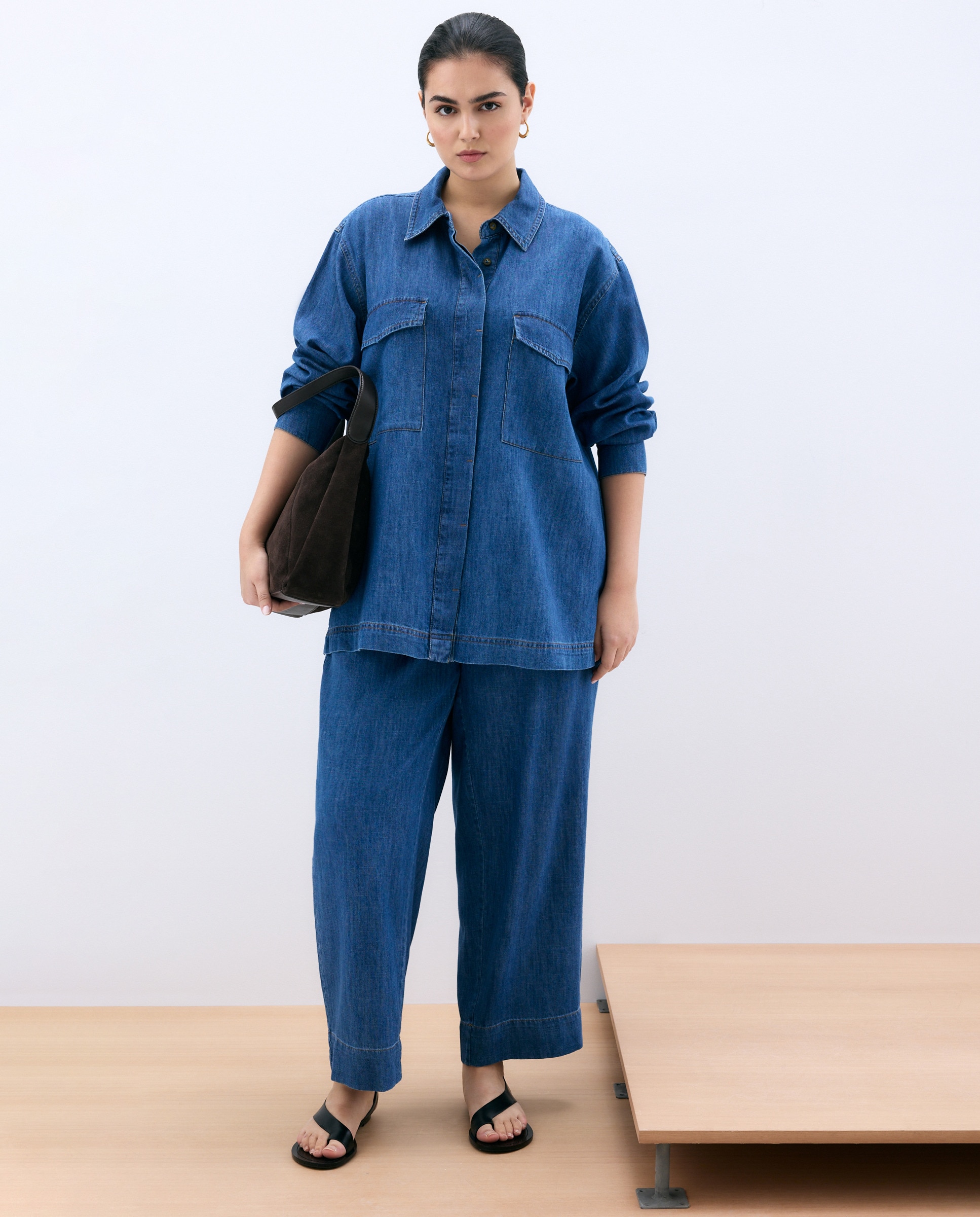 Imagem 0 de Jeans Largas com Cinco Bolsos