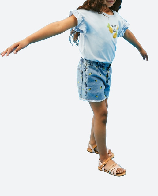 Imagen 0 de Short denim de niña con bordado