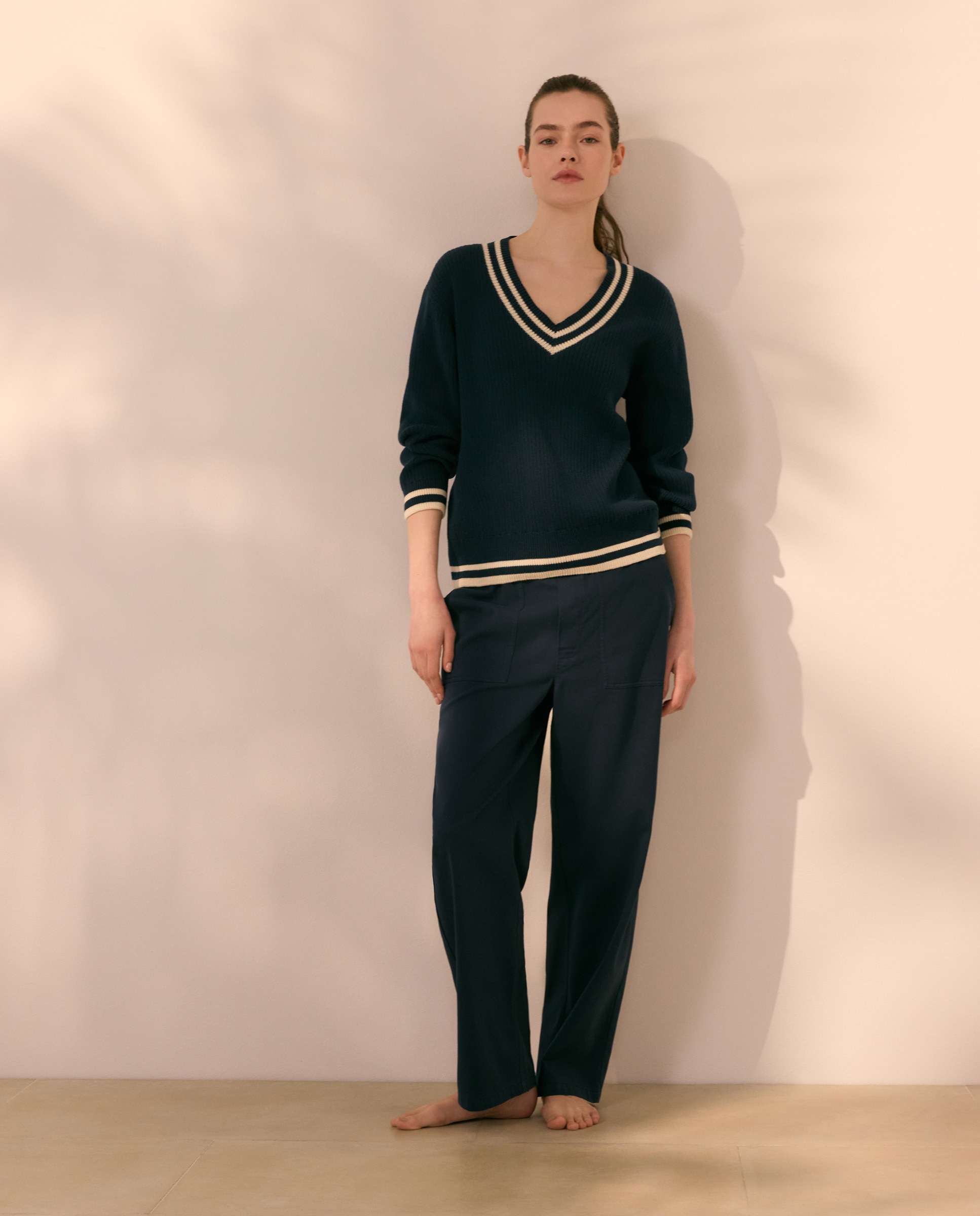 Imagem 0 de Calças Lisas com Bolsos