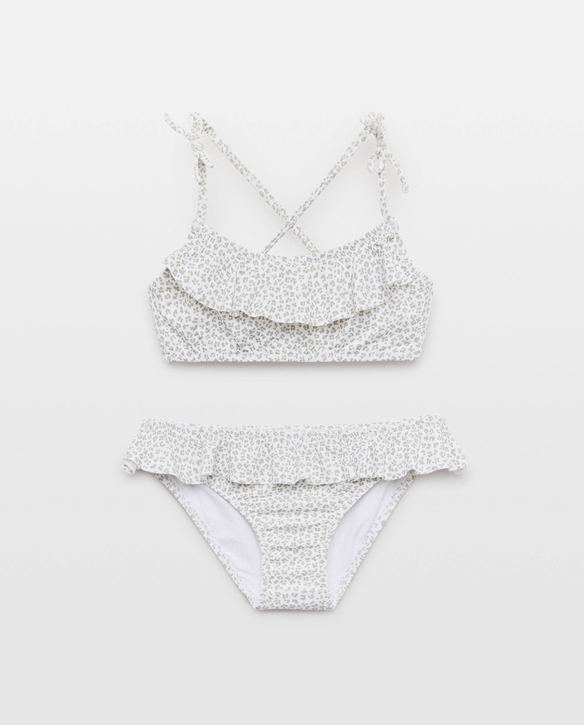 Imagen 0 de Bikini niña  volante y lazos mancha