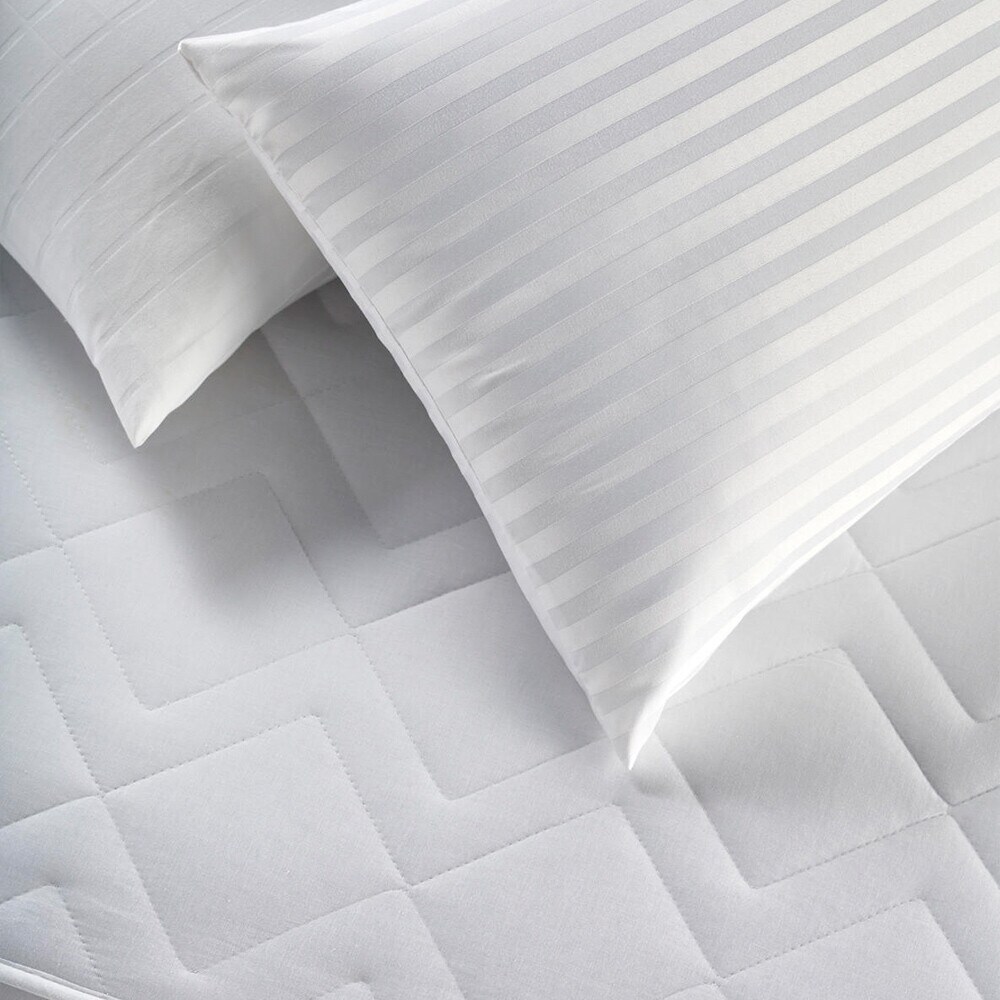 en nórdicos, almohadas, y protectores